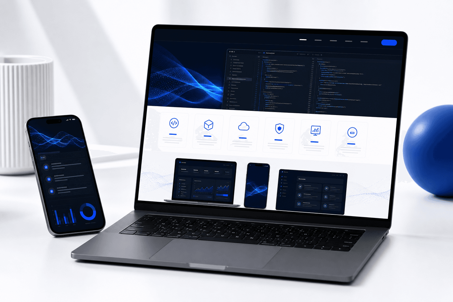 VisionStack services — software development website on laptop and phone